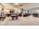 Large basement featuring a pool table, bar area, and comfortable seating for entertaining guests at 1272 Nightfire Cir, Castle Rock, CO 80104