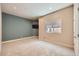 Bedroom features neutral walls and plush carpeting for a cozy and inviting space at 1272 Nightfire Cir, Castle Rock, CO 80104