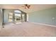 Large bedroom featuring carpeted floors, natural lighting from multiple windows, and vaulted ceiling at 1272 Nightfire Cir, Castle Rock, CO 80104