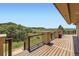 Expansive wooden deck providing unobstructed views of the natural landscape at 1272 Nightfire Cir, Castle Rock, CO 80104