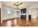 Chic dining room featuring hardwood floors, sophisticated lighting, and stylish built-in cabinetry at 1272 Nightfire Cir, Castle Rock, CO 80104