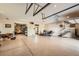 Spacious garage featuring epoxy flooring and additional storage areas at 1272 Nightfire Cir, Castle Rock, CO 80104