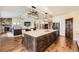 Open concept kitchen with an island, pendant lighting, modern appliances, and an inviting atmosphere at 1272 Nightfire Cir, Castle Rock, CO 80104