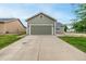 Charming home featuring a two-car garage, expansive driveway, and well-maintained landscaping at 268 Naples St, Firestone, CO 80520