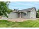 Side view of a house with rock garden at 268 Naples St, Firestone, CO 80520