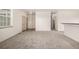 Spacious, bright living room with plush carpet at 268 Naples St, Firestone, CO 80520