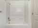 Clean shower and tub combo with white tiling at 268 Naples St, Firestone, CO 80520