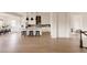 Spacious open concept features a well-equipped kitchen and large dining area, perfect for entertaining at 6608 S White Crow Ct, Aurora, CO 80016
