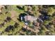 Stunning aerial shot of the property nestled among lush greenery, offering privacy and natural beauty at 160 Bristlecone Way, Boulder, CO 80304