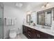 Bright bathroom features double vanity with marble countertop and modern fixtures at 160 Bristlecone Way, Boulder, CO 80304