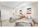 Bright bedroom with two twin beds, cozy decor, and track lighting at 160 Bristlecone Way, Boulder, CO 80304