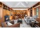 Cozy living room featuring wood-paneled built-in shelving, fireplace, and neutral decor at 160 Bristlecone Way, Boulder, CO 80304