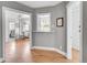 Cozy dining area adjacent to a modern kitchen, featuring hardwood floors and natural light at 215 E 11Th Ave # D8, Denver, CO 80203