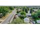 Home in mature neighborhood featuring a fenced yard with off-street parking and a storage shed at 103 S Zenobia St, Denver, CO 80219