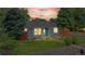 Charming home featuring a well-maintained lawn, mature trees, and a light blue front door at 103 S Zenobia St, Denver, CO 80219