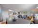 Open living space featuring hardwood floors, a dining area, and a comfortable seating area at 103 S Zenobia St, Denver, CO 80219