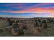 Stunning aerial view showcases the beautiful house, outdoor pavilion, and surrounding greenery at 5625 Twilight Way, Parker, CO 80134