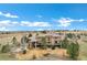 Aerial view showcases the home's expansive backyard, outdoor living spaces, and mature landscaping at 5625 Twilight Way, Parker, CO 80134