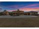 Beautiful home exterior features a circular driveway, stone accents, and attached garages at 5625 Twilight Way, Parker, CO 80134