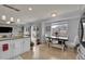 Modern kitchen with stainless steel appliances and breakfast nook at 2946 S Espana Ct, Aurora, CO 80013