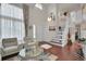 Bright living room with hardwood floors and high ceilings at 2946 S Espana Ct, Aurora, CO 80013