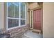 Welcoming front porch with brick detail, large window, and decorative front door at 12114 Alcott St, Westminster, CO 80234