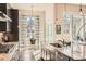 Well-lit kitchen with granite countertops, a breakfast nook, and stainless appliances at 12114 Alcott St, Westminster, CO 80234