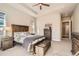 Cozy main bedroom with a ceiling fan, stylish furniture, and plenty of natural light at 12114 Alcott St, Westminster, CO 80234