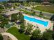 Community pool and clubhouse with lounge chairs for residents to enjoy poolside at 12114 Alcott St, Westminster, CO 80234