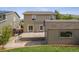This backyard has a patio and a storage shed at the back at 9697 Marmot Ridge Cir, Littleton, CO 80125