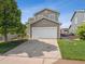 Beautiful 2-story home with a well-maintained front yard and a spacious driveway, offering comfort at 9697 Marmot Ridge Cir, Littleton, CO 80125