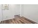 Hallway with modern floors and neutral paint at 9697 Marmot Ridge Cir, Littleton, CO 80125