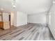 Airy living area with modern flooring and ample space, combining style and functionality at 9697 Marmot Ridge Cir, Littleton, CO 80125