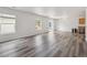 Bright living area with new floors, freshly painted walls, and natural light creates a welcoming space at 9697 Marmot Ridge Cir, Littleton, CO 80125