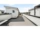 Spacious rooftop deck with seating and city views, ideal for outdoor gatherings and relaxation at 3520 W Connejos Pl # 5, Denver, CO 80204