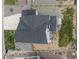 Overhead shot of a house showing the roof, landscaping, and proximity to other homes and the street at 1143 Williams Loop, Elizabeth, CO 80107