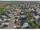 Scenic view of a residential community, featuring manicured lawns, and various home styles at 1143 Williams Loop, Elizabeth, CO 80107