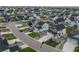 Beautiful view of new homes in a suburban neighborhood, complete with sidewalks and landscaped yards at 1143 Williams Loop, Elizabeth, CO 80107