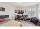Bedroom decorated with musical items and a workspace for comfort and creativity at 1143 Williams Loop, Elizabeth, CO 80107