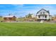 Charming home with well-manicured lawn, historic windmill, and quaint wooden shed for a touch of nostalgia at 1143 Williams Loop, Elizabeth, CO 80107