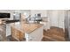 Bright, open kitchen featuring an island with granite countertops and stainless steel appliances at 1143 Williams Loop, Elizabeth, CO 80107