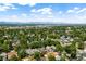 Picturesque aerial shot showcasing a sprawling residential area with mountain views in the background at 534 S Pearl St, Denver, CO 80209