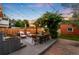 Outdoor patio with lounge chairs, dining table and string lights, perfect for entertaining at 534 S Pearl St, Denver, CO 80209