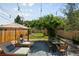 Outdoor patio with lounge chairs, dining table and string lights, perfect for entertaining at 534 S Pearl St, Denver, CO 80209