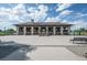 Beautiful building situated next to a lake with steps leading up to the entrance at 534 S Pearl St, Denver, CO 80209