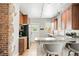 Kitchen features granite countertops, stainless steel appliances, and wooden cabinets at 534 S Pearl St, Denver, CO 80209