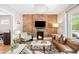 Inviting living room with brick fireplace, comfortable seating, and stylish decor at 534 S Pearl St, Denver, CO 80209