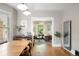 Open floor plan with dining room flowing into a cozy living room area at 534 S Pearl St, Denver, CO 80209