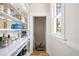 Pantry with ample storage shelving, perfect for organizing kitchen essentials at 534 S Pearl St, Denver, CO 80209