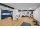 Spacious finished basement with living area and stylish blue kitchen at 2684 Taft Ct, Lakewood, CO 80215